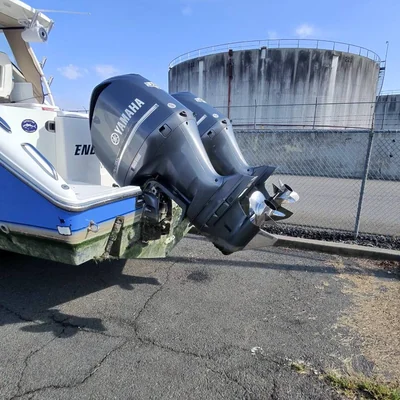 Twin Yamaha outboard engines on the stern of a boat, cleaned