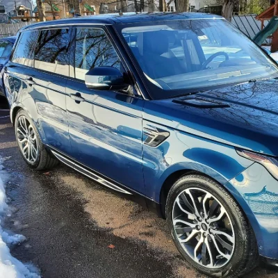 A dark blue Range Rover Sport with a wet-look finish after a Rashine detail